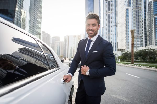 Businessman portrait Handsome caucasian businessman - Portrait of a businessman walking outdoors