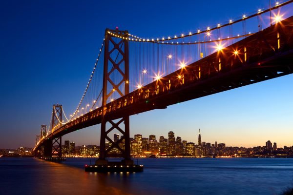 San Francisco San Francisco skyline and Bay Bridge at sunset, California, USA